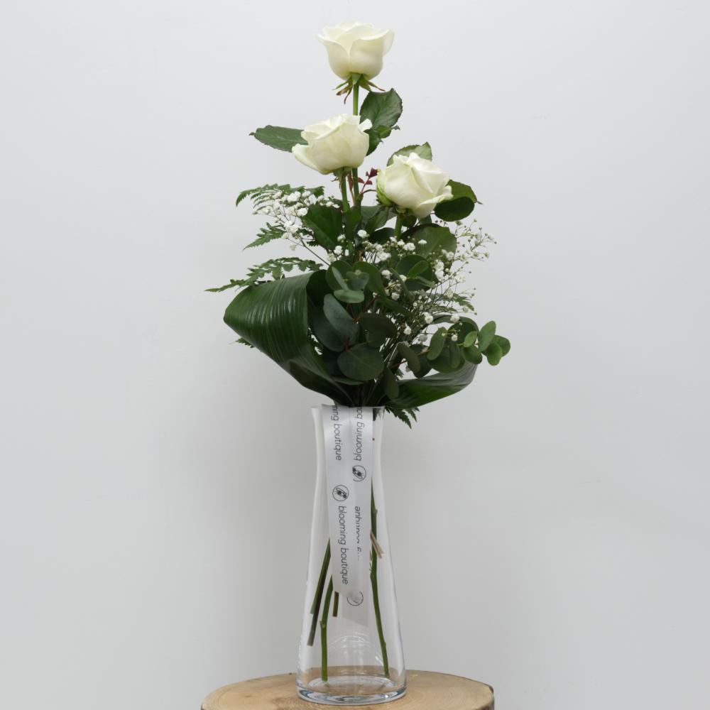 Gentle Kiss - Three White Roses with White Gypsophila Include Vase. Ideal as Small Valentine's Day or Mother's Day Token. We deliver flowers throughout Dublin and Ireland. Please place your order by 1 pm for Same Day Flower Delivery Dublin or Next Day Flowers Delivery Ireland
