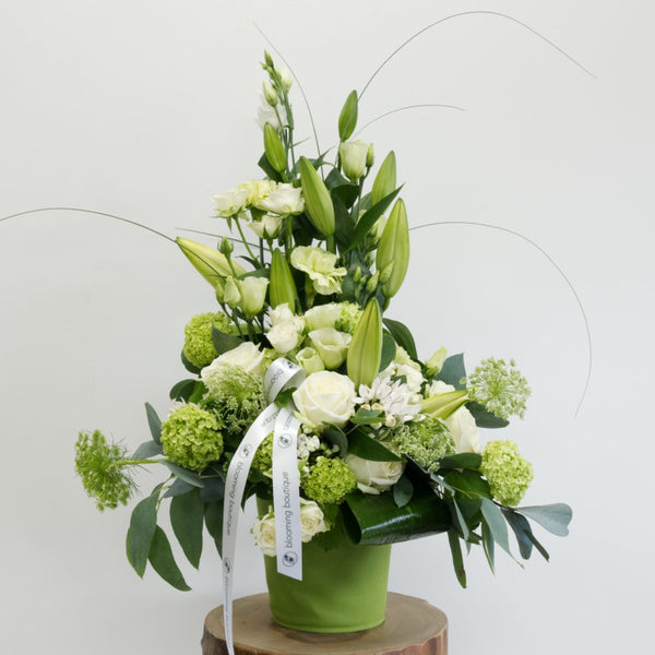The Green Simplicity, an arrangement in green and white flowers represents a pure beauty of nature. Featured in "The Green Pot" from the Blooming Walls® collection, unique plant pot for outdoor or indoor use. Please place your order by 1 pm for Same Day Flower Delivery Dublin or Next Day Flowers Delivery Ireland
