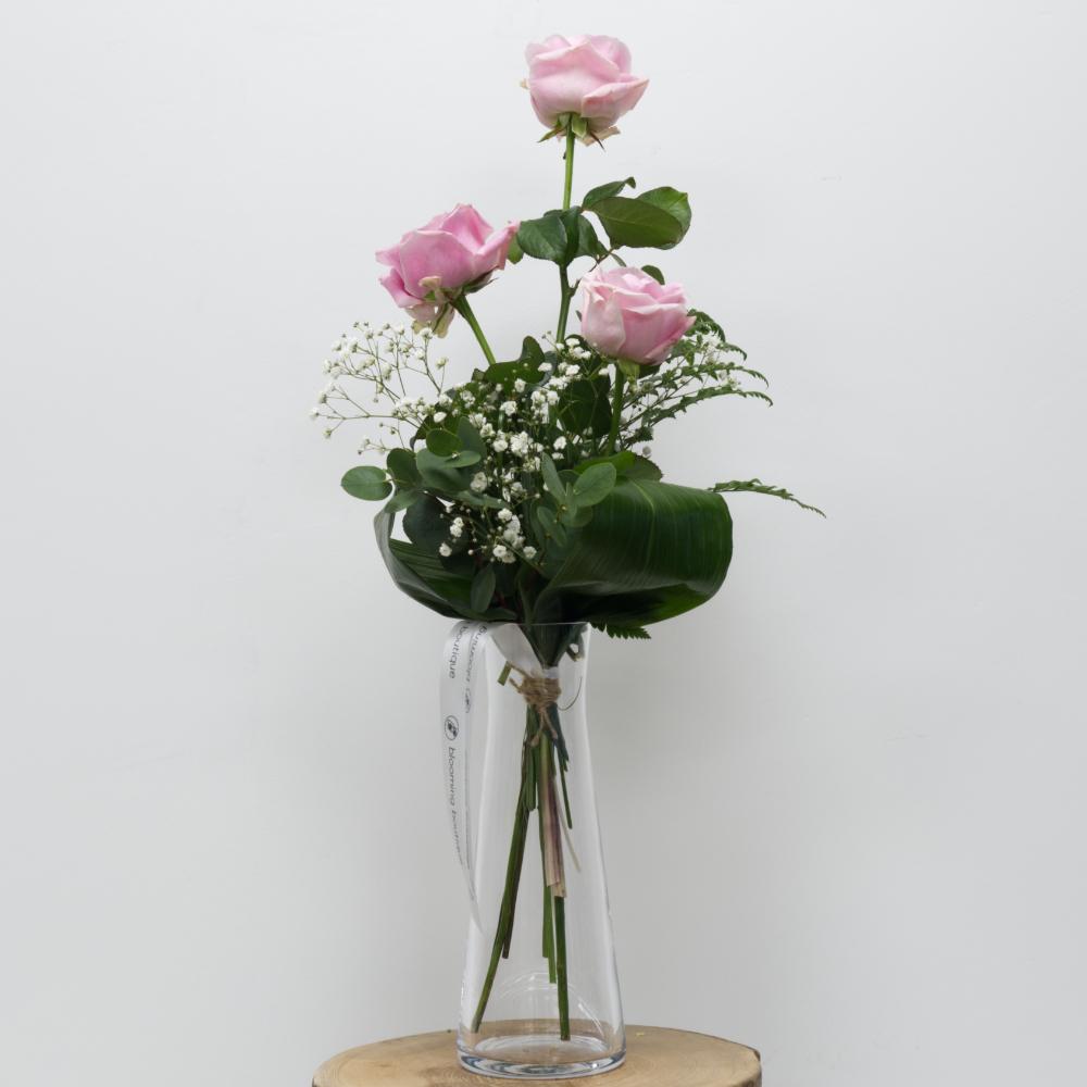 Three Pink Roses with White Gypsophila Include Vase. Ideal as Small Valentine's Day or Mother's Day Token. We deliver flowers throughout Dublin and Ireland.Please place your order by 1 pm for Same Day Flower Delivery Dublin or Next Day Flowers Delivery Ireland