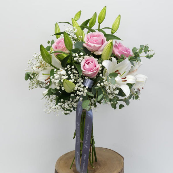 The fabulous combination of large-headed pink Roses and stunning white Oriental Lilies is a great gift for any occasion. The bouquet pictured is a medium size. We deliver flowers throughout Dublin and Ireland. Please place your order by 1 pm for Same Day Flower Delivery Dublin or Next Day Flowers Delivery Ireland