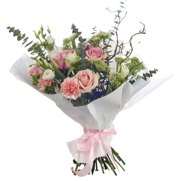 Soft colours of this bouquet with Roses, Lisianthus, Carnations, effortlessly contrasted with seasonal flowers. We deliver flowers throughout Dublin and Ireland