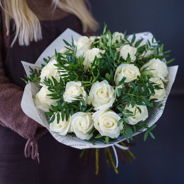 A gorgeous hand-tied bouquet of 12 large white roses, pure beauty for special occasions.Same Day Flower Delivery Dublin or Next Day Flowers Delivery Ireland